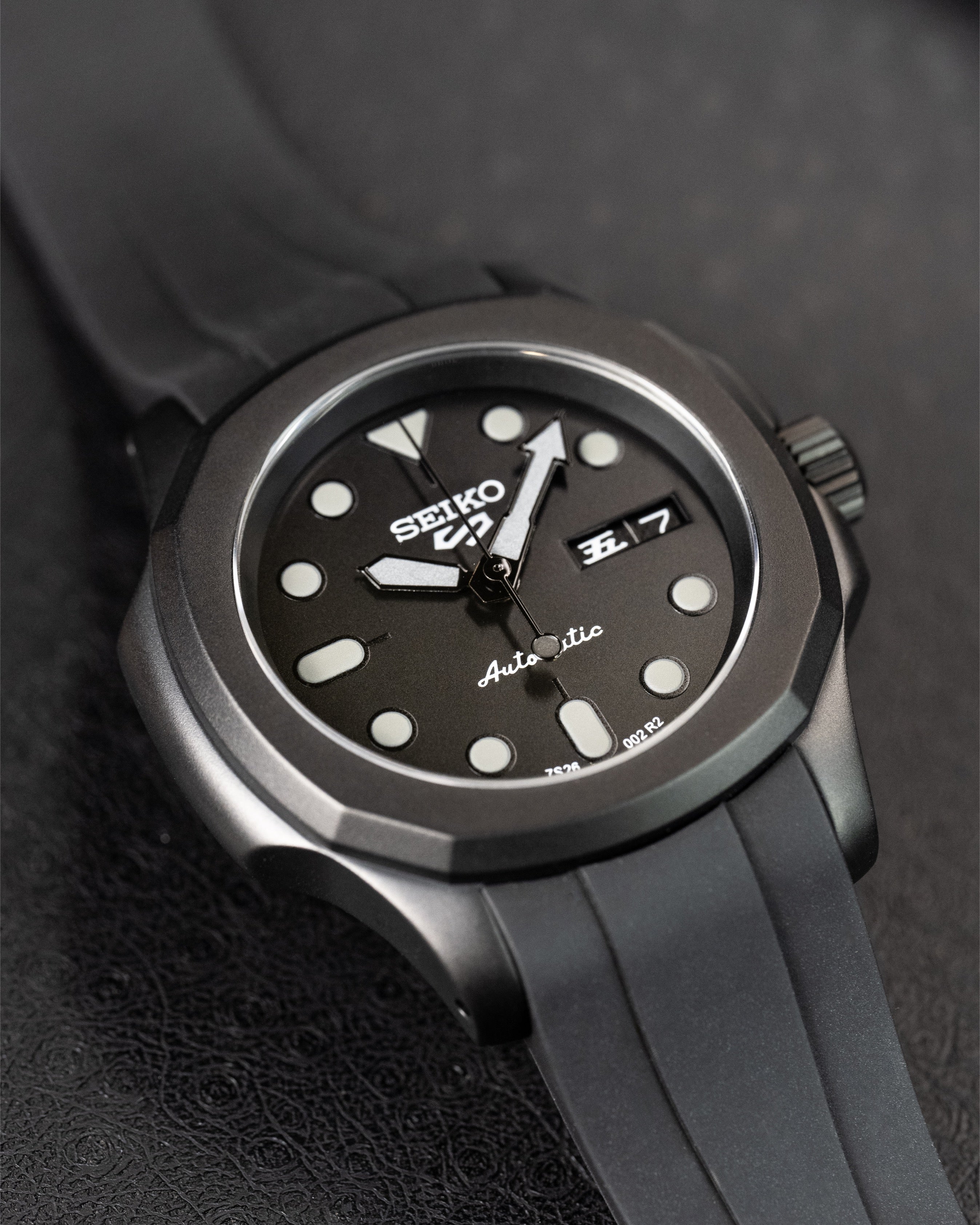 Custom Seiko 5 Mod Blackout – Watch With Matte Black Stealth Nautilus Case Black Dial With Bold Lume Markers Arrow Handset And Black Rubber Strap