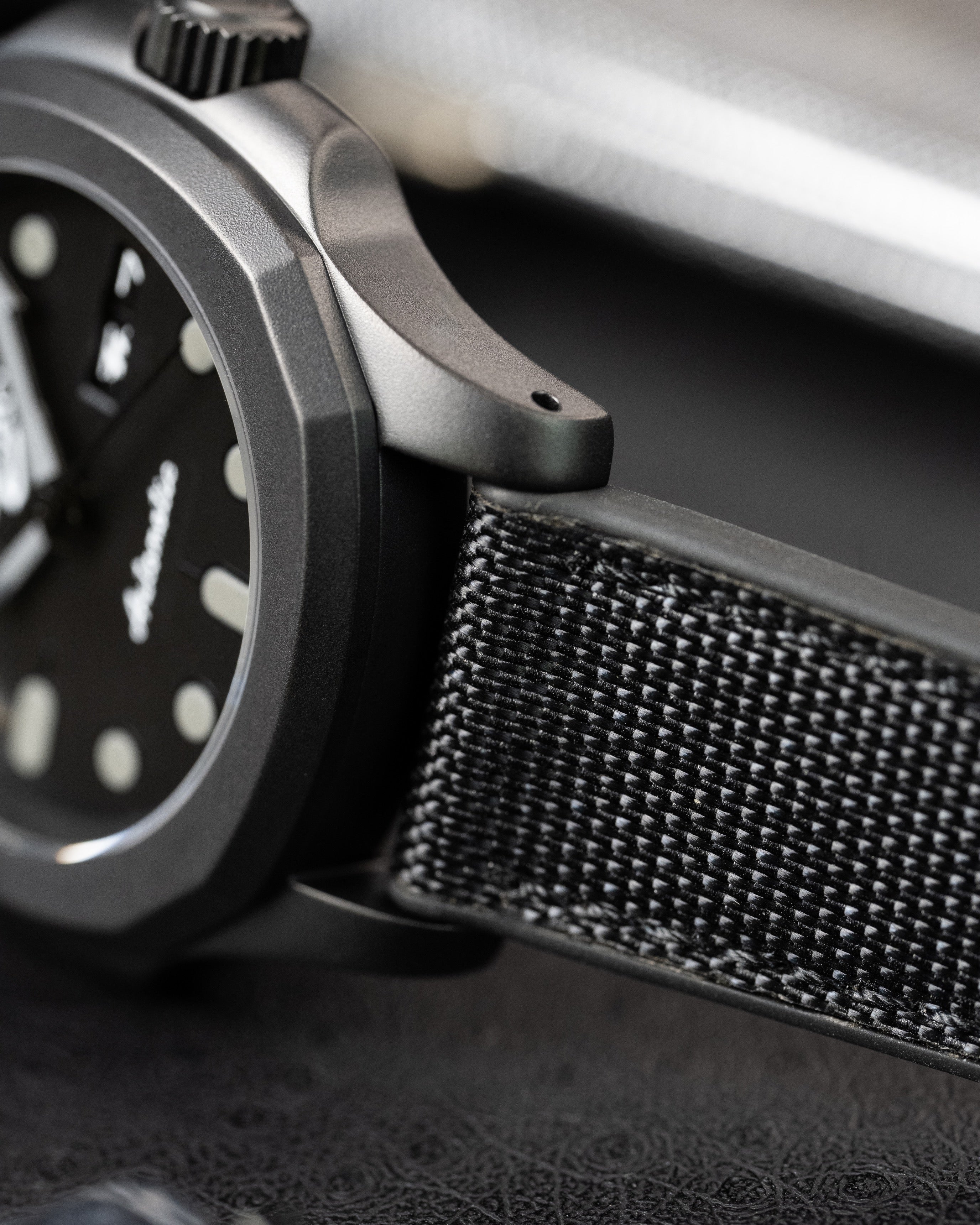 Custom Seiko 5 Mod Blackout – Watch With Matte Black Stealth Nautilus Case Black Dial With Bold Lume Markers Arrow Handset And Canvas Strap