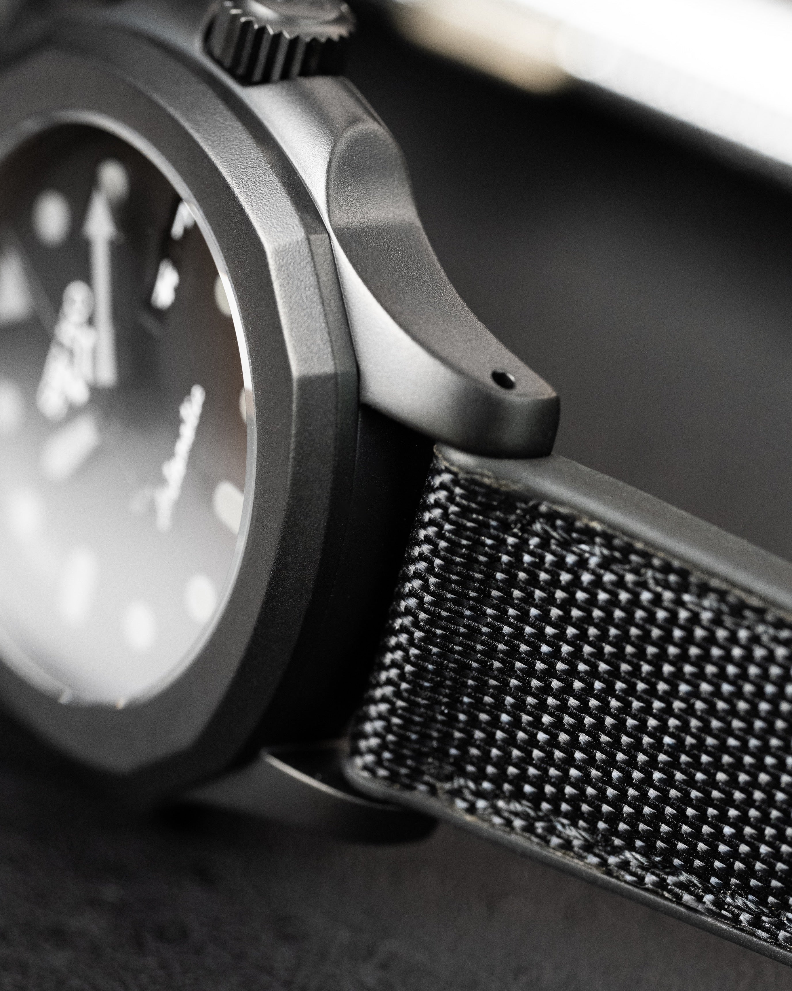 Custom Seiko 5 Mod Blackout – Watch With Matte Black Stealth Nautilus Case Black Dial With Bold Lume Markers Arrow Handset And Canvas Strap