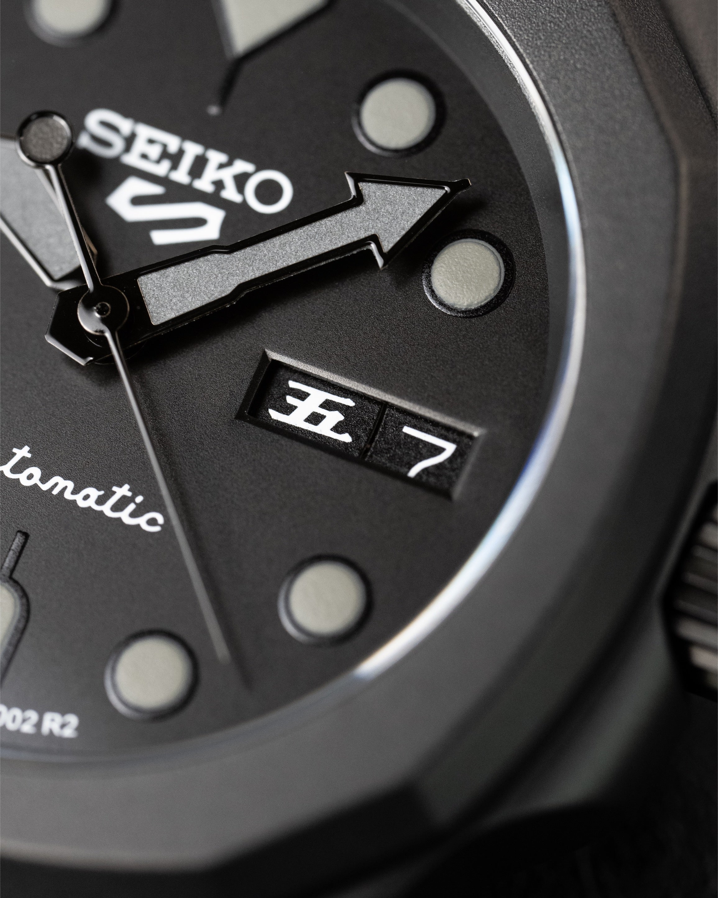 Custom Seiko 5 Mod Blackout – Watch With Matte Black Stealth Nautilus Case Black Dial With Bold Lume Markers Arrow Handset And Canvas Strap
