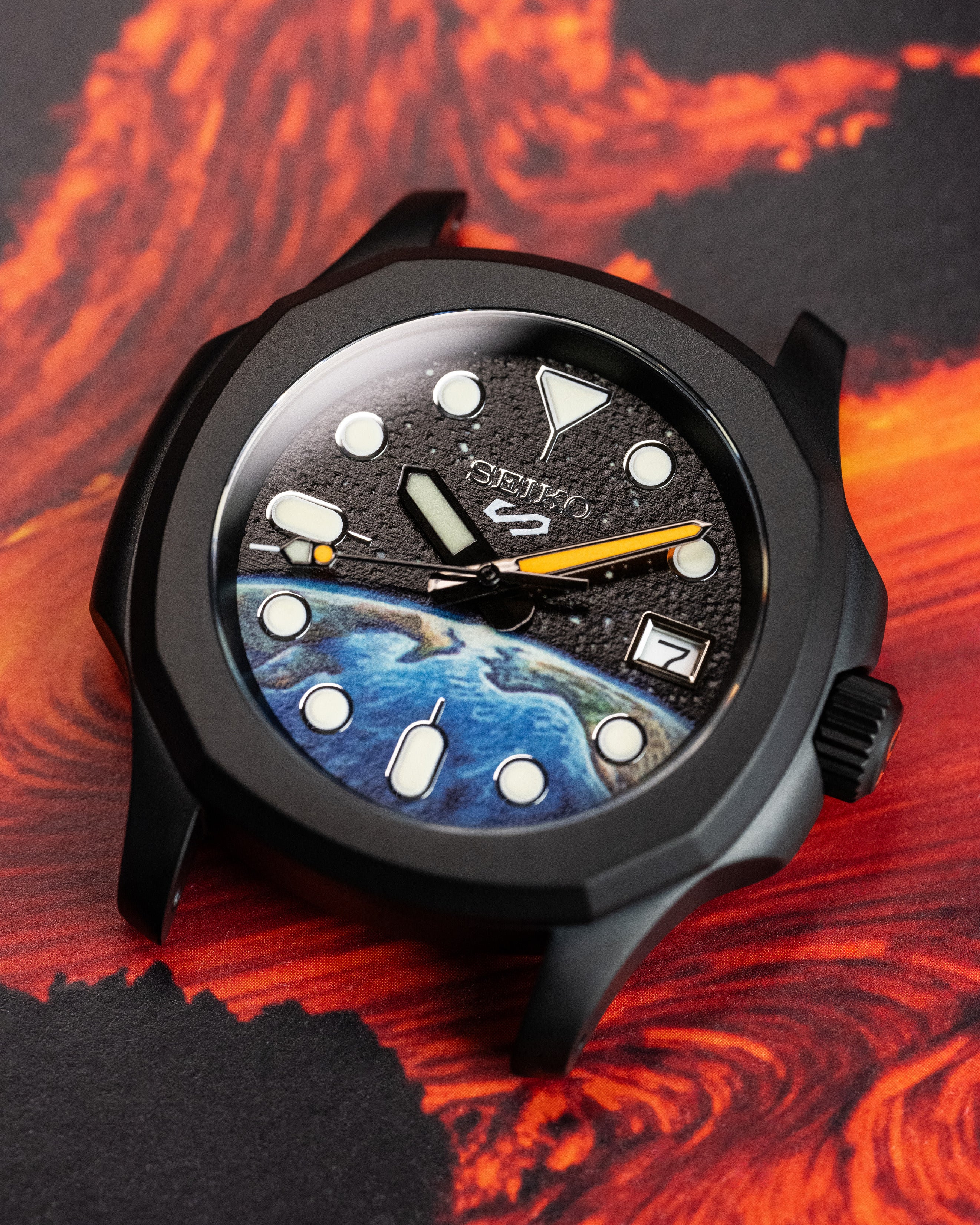 Custom Seiko 5 Mod Watch – Space Inspired Dial With Earth Artwork Matte Black Nautilus Case Orange-Accented Hands And Black Nato Strap
