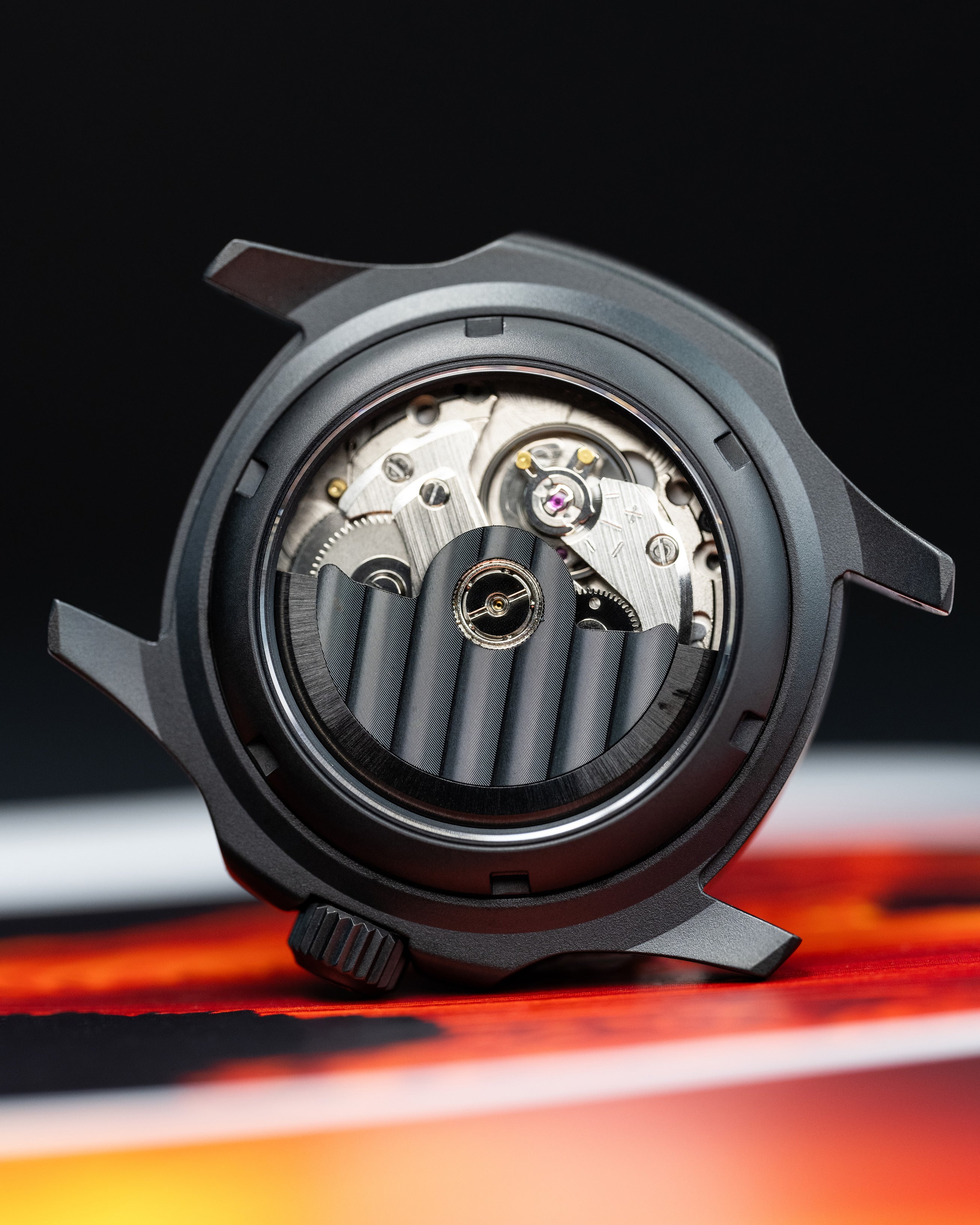 Custom Seiko 5 Mod Watch – Space Inspired Dial With Earth Artwork Matte Black Nautilus Case Orange-Accented Hands And Black Nato Strap