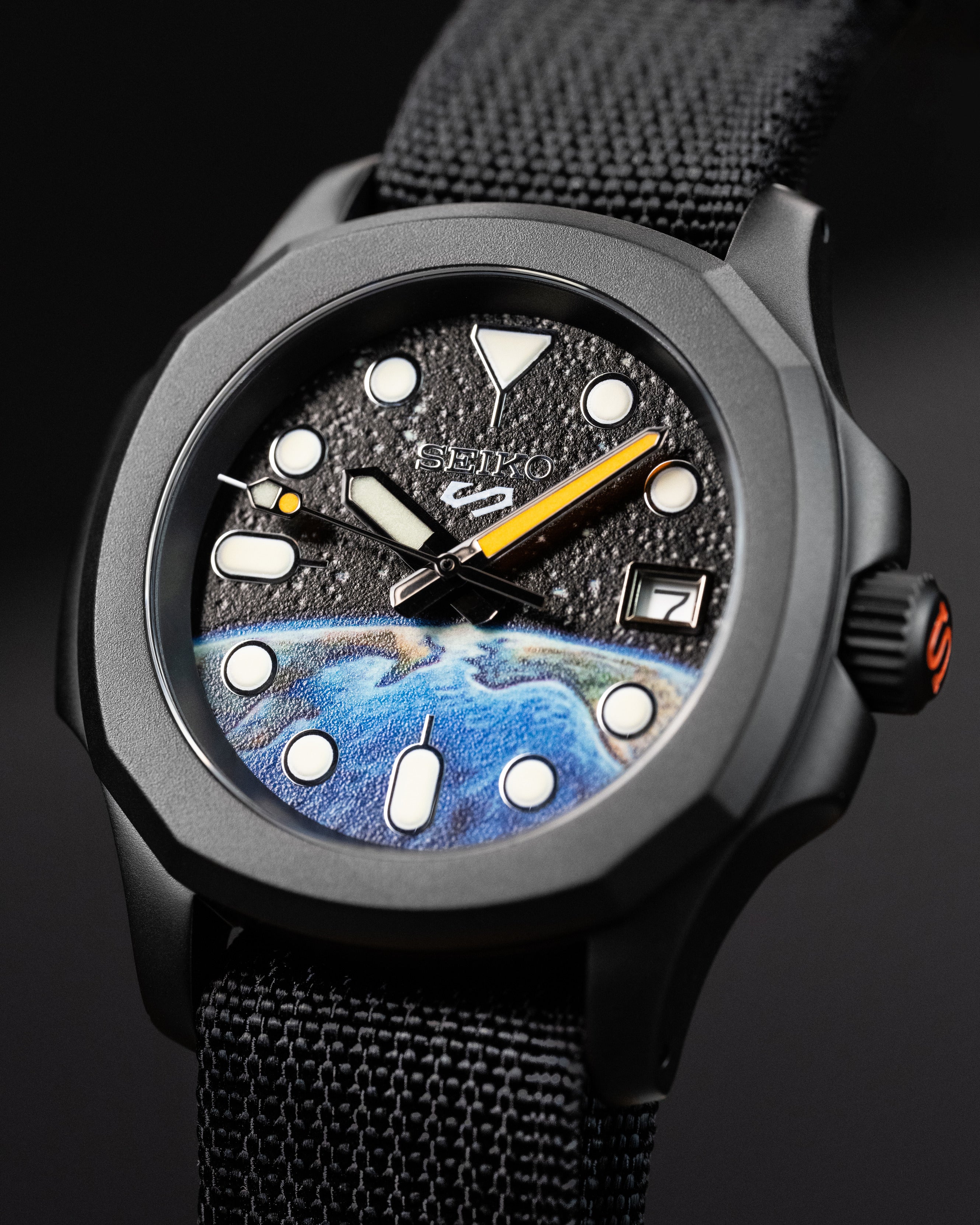 Custom Seiko 5 Mod Watch – Space Inspired Dial With Earth Artwork Matte Black Nautilus Case Orange-Accented Hands And Black Nato Strap