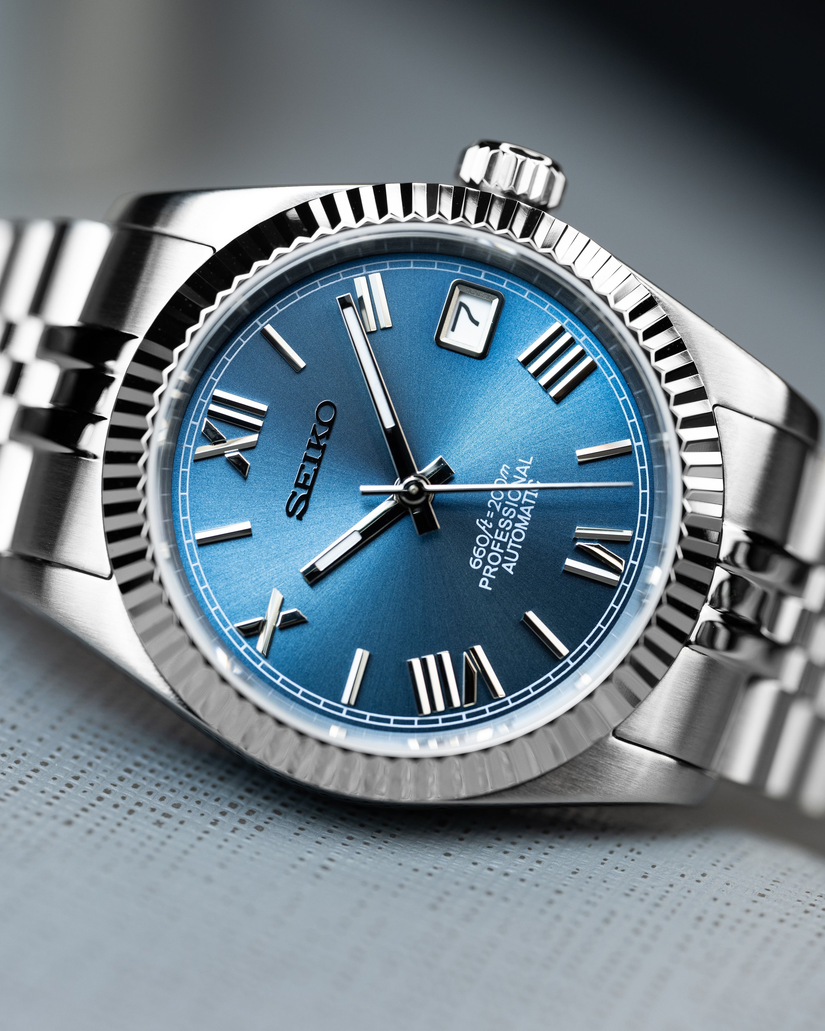 Custom Seiko Datejust – Mod With Ice Blue Roman Numeral Dial Fluted Bezel Jubilee Bracelet And Automatic Movement
