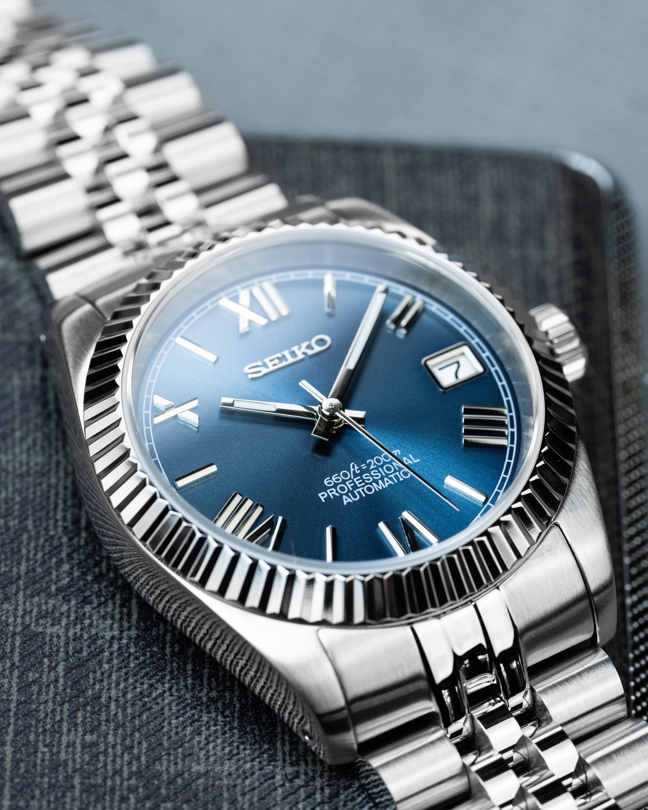 Custom Seiko Datejust – Mod With Ice Blue Roman Numeral Dial Fluted Bezel Jubilee Bracelet And Automatic Movement