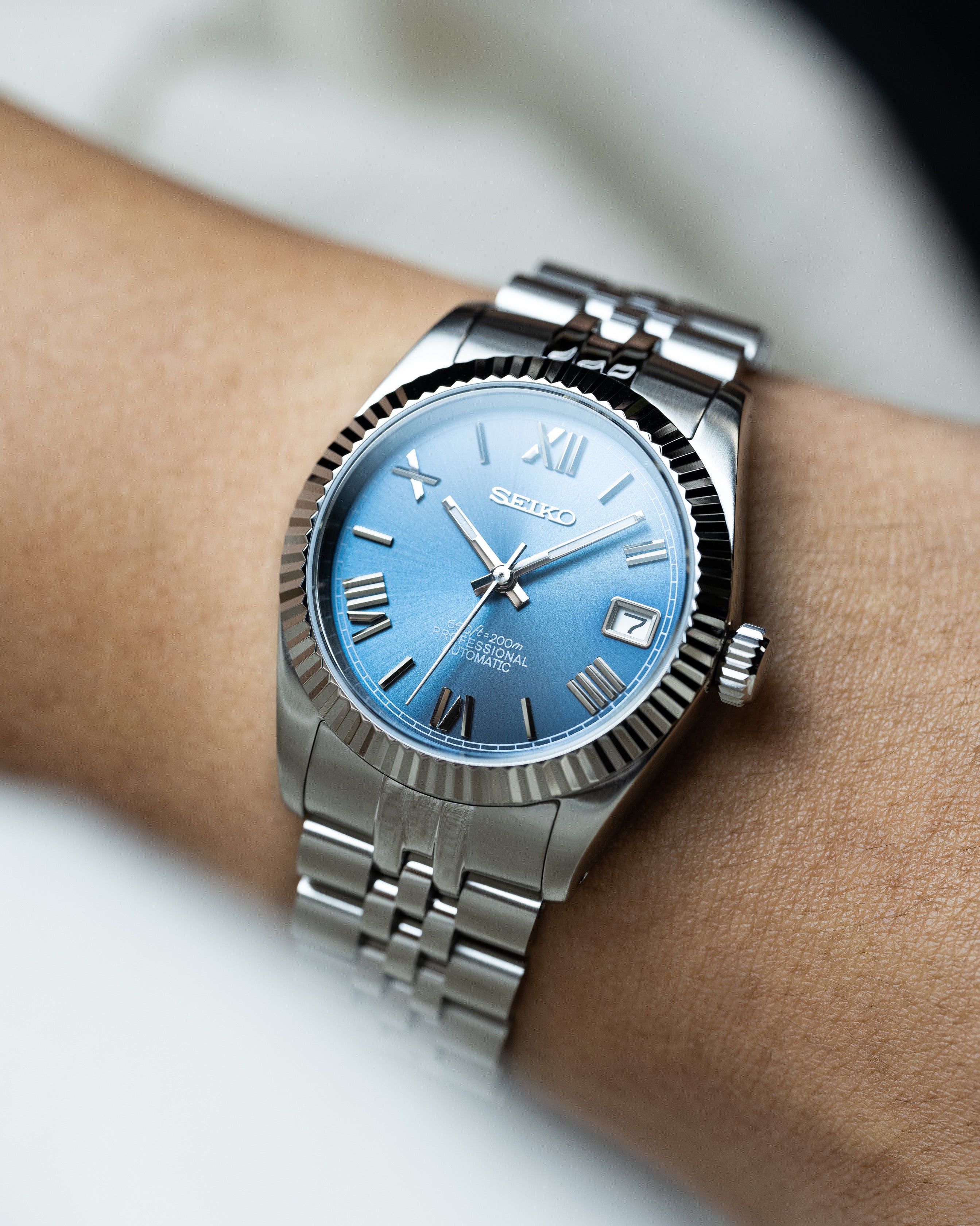 Custom Seiko Datejust – Mod With Ice Blue Roman Numeral Dial Fluted Bezel Jubilee Bracelet And Automatic Movement