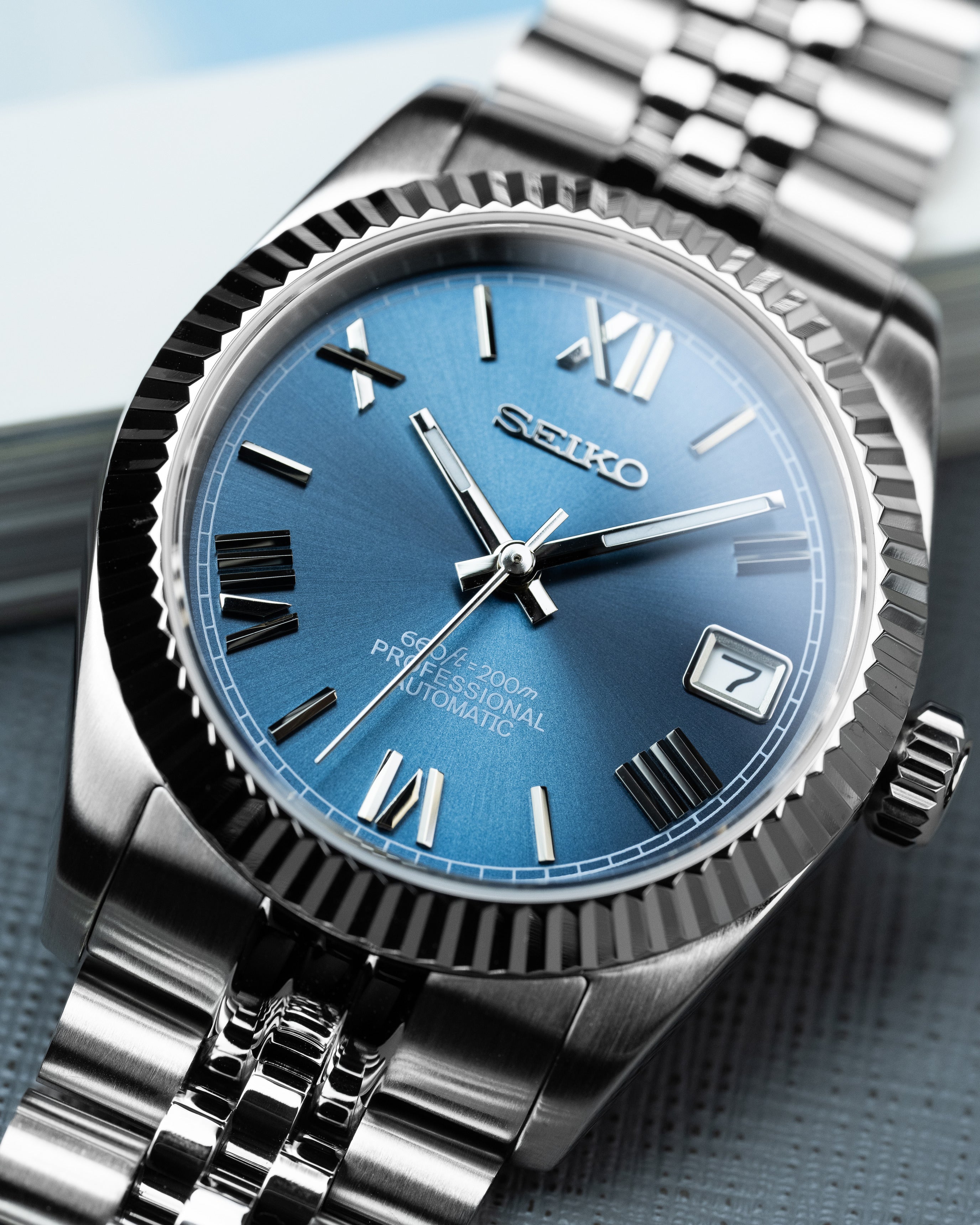 Custom Seiko Datejust – Mod With Ice Blue Roman Numeral Dial Fluted Bezel Jubilee Bracelet And Automatic Movement