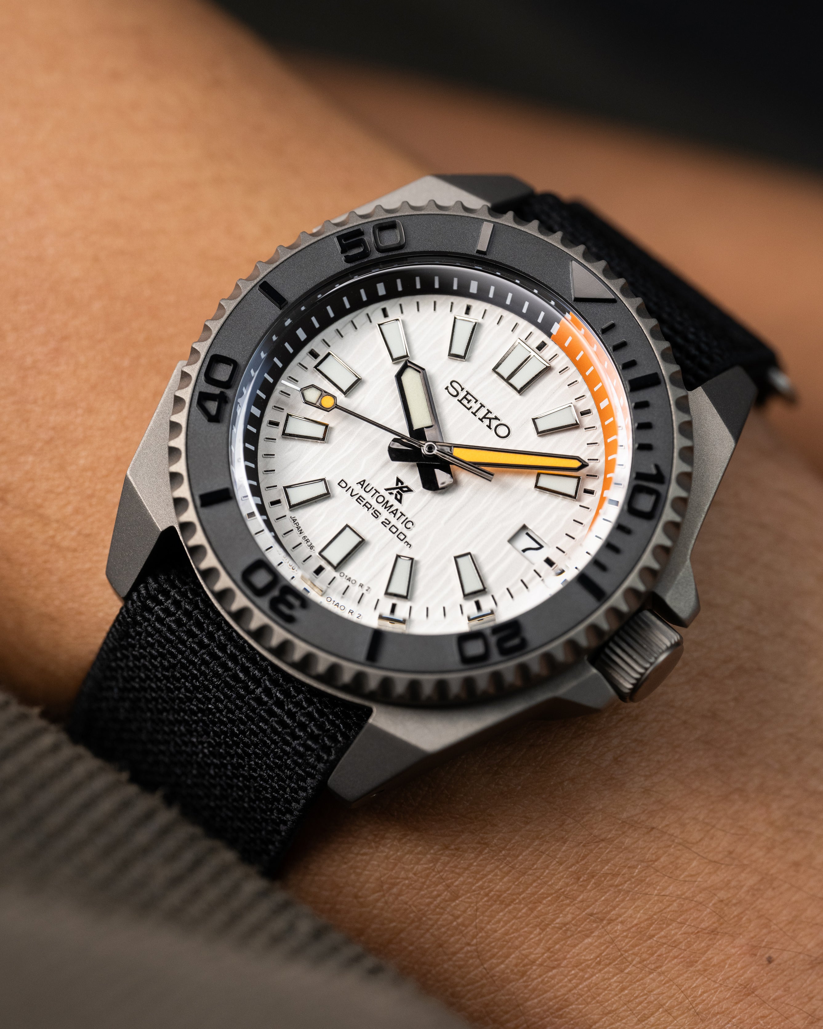 Custom Seiko Diver – Mod With Titanium Samurai Case White Birch Texture Dial Black And Orange Minute Track Chapter Ring Orange Tipped Seconds Hand Black Parachute Strap4