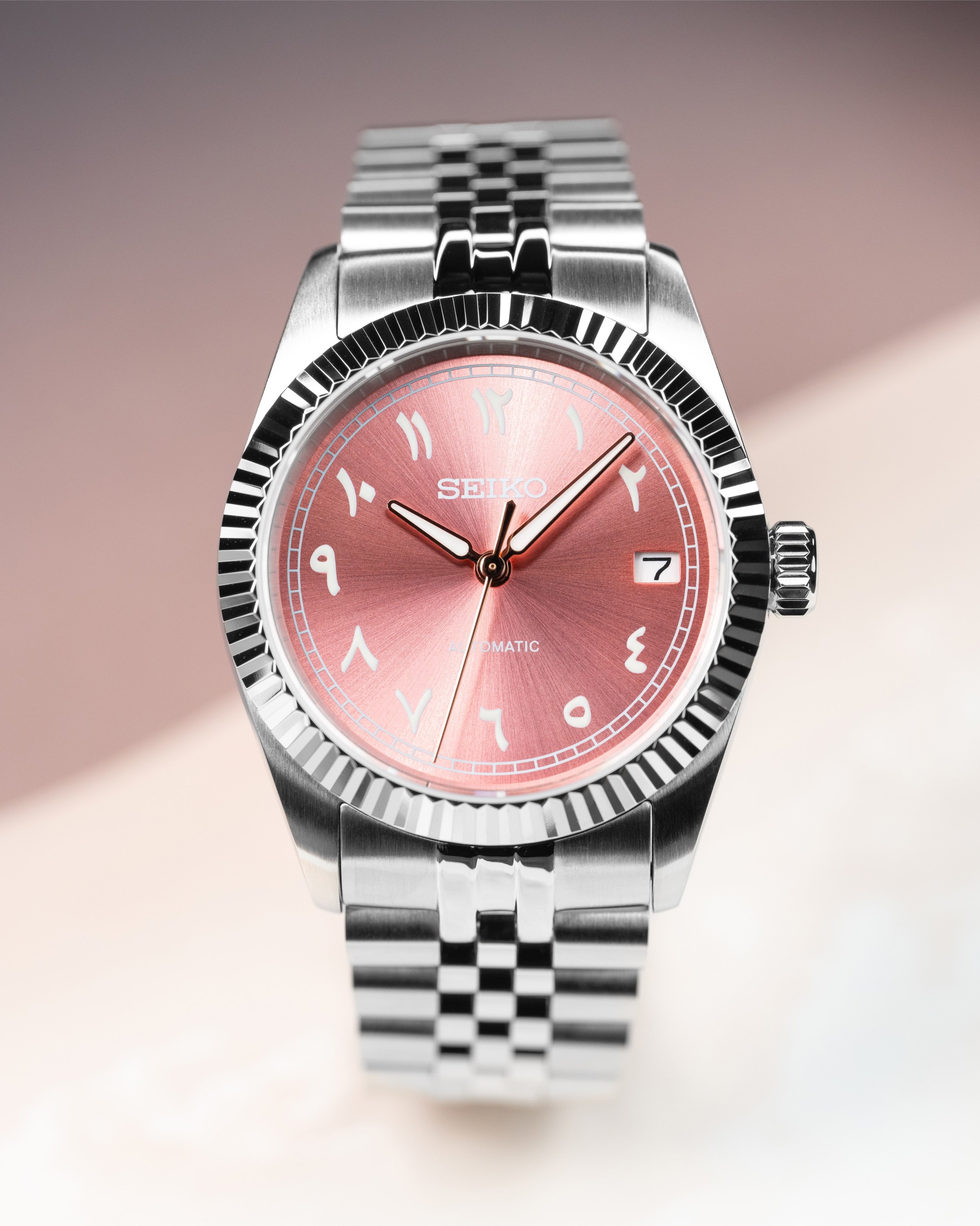 Custom Seiko Mod – Arabic Numeral Dial Watch With Sunburst Pink Dial Fluted Bezel Jubilee Stainless Steel Bracelet1