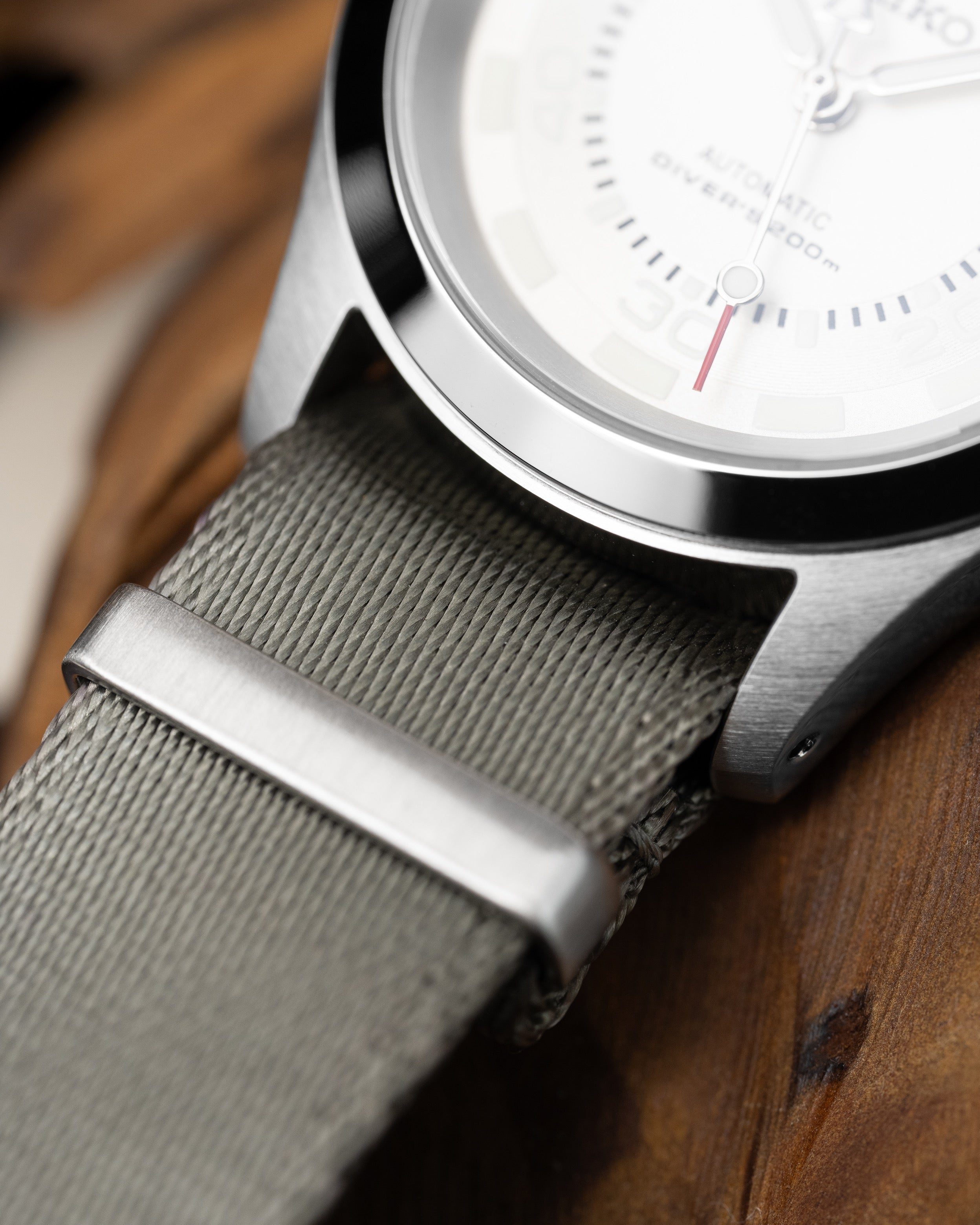 Custom Seiko Mod – Diver Watch With Full Matte Silver Poker Dial Red-Tipped Seconds Hand Grey Nato Strap6