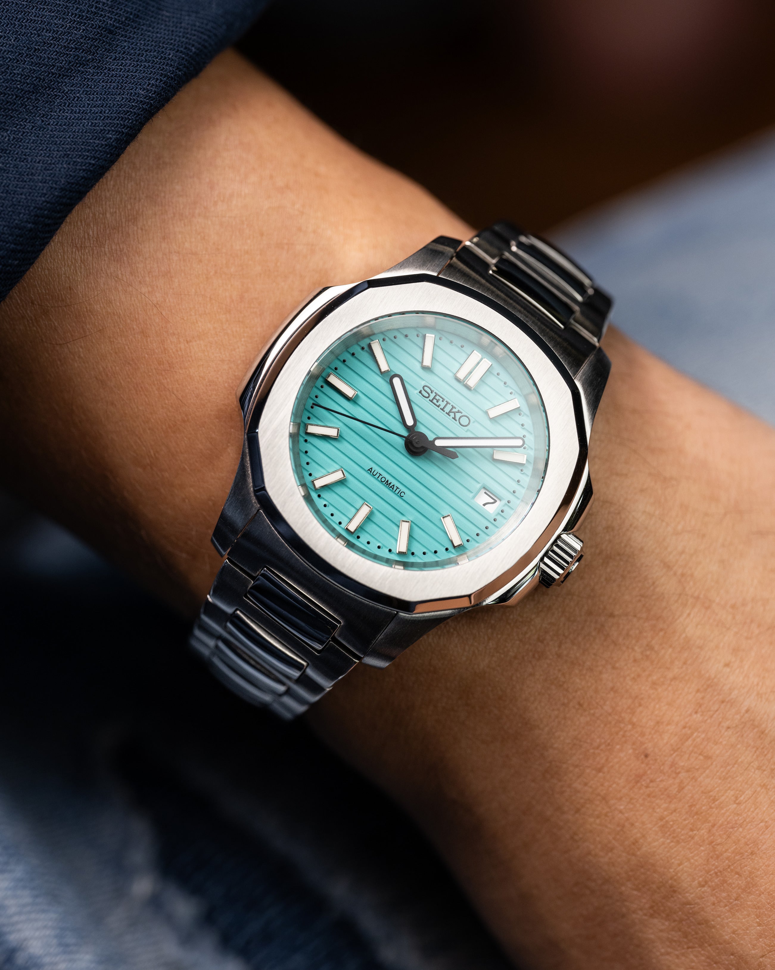 Custom Seiko Mod – Nautilus Homage With Tiffany Blue Textured Dial Brushed Stainless Steel Case And Integrated Bracelet Wearing On Hand2
