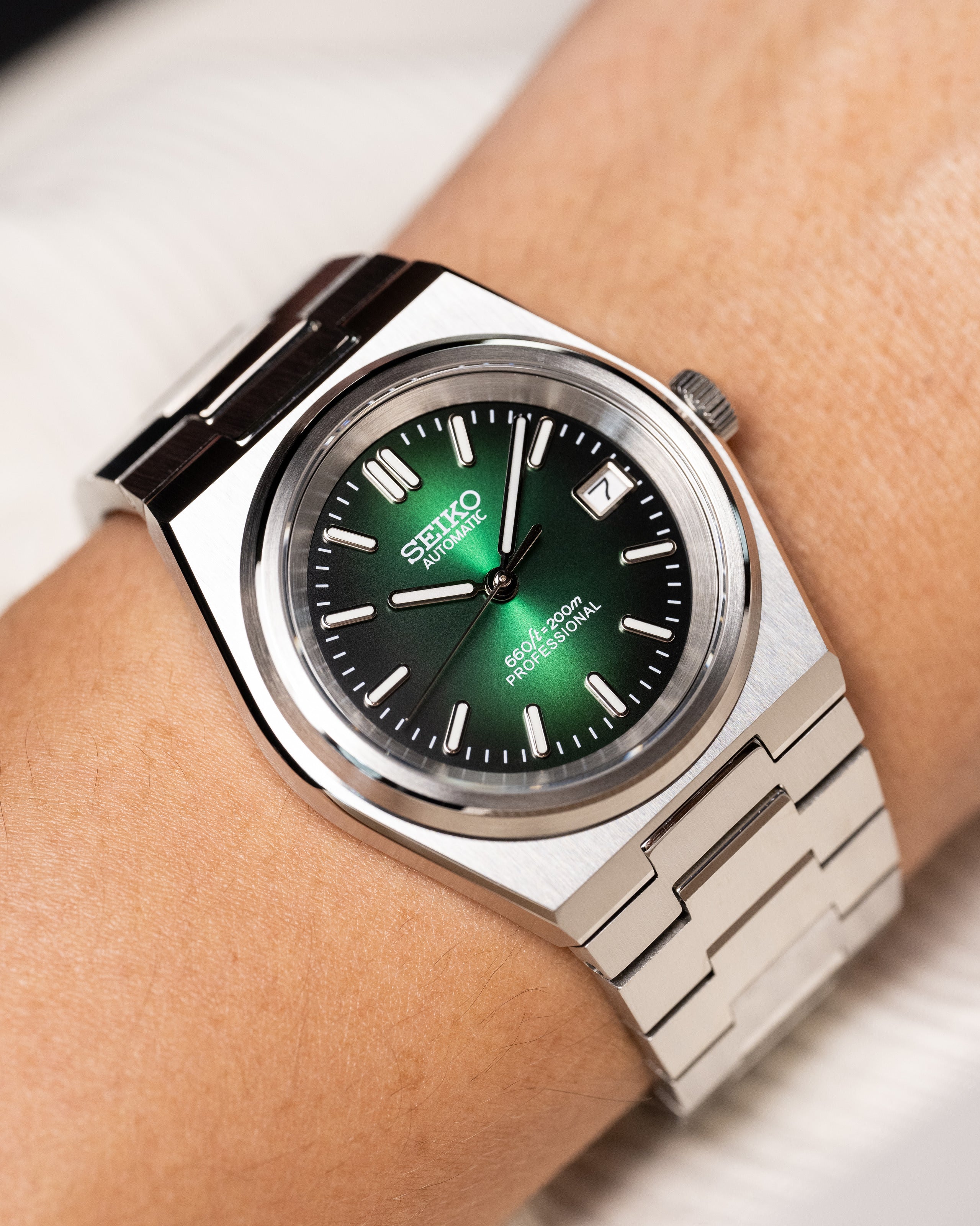 Custom Seiko Mod – PRX With Integrated Stainless Steel Bracelet And Green Sunburst Dial Worn On Hand