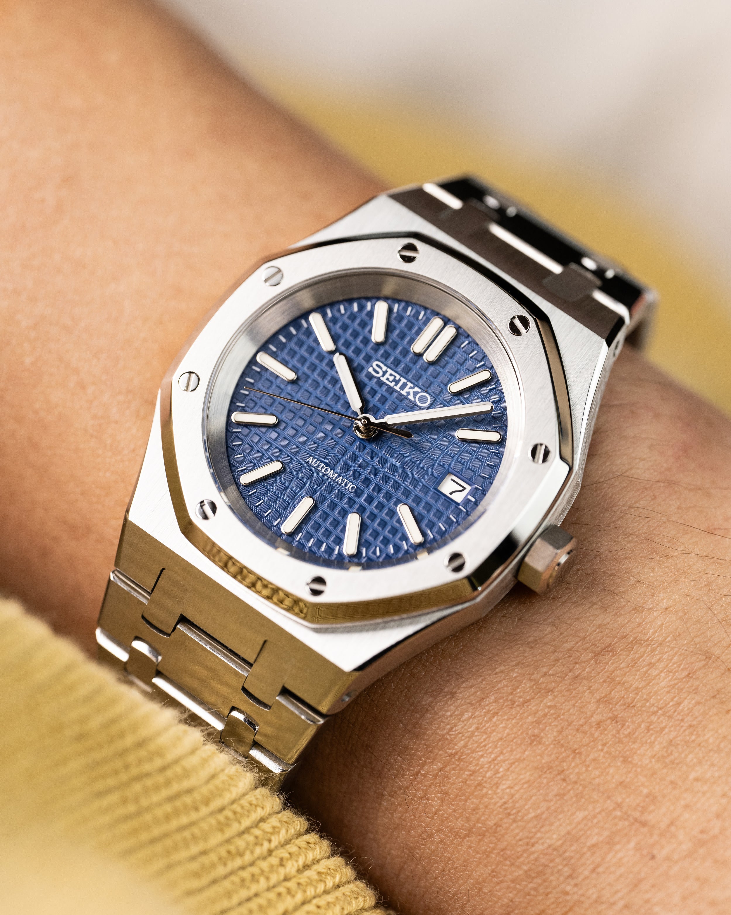 Custom Seiko Mod – Royal Oak Ap Homage With Brushed Stainless Steel Integrated Bracelet Blue Waffle-Textured Tapisserie Dial And Octagonal Bezel Wearing On Hand3