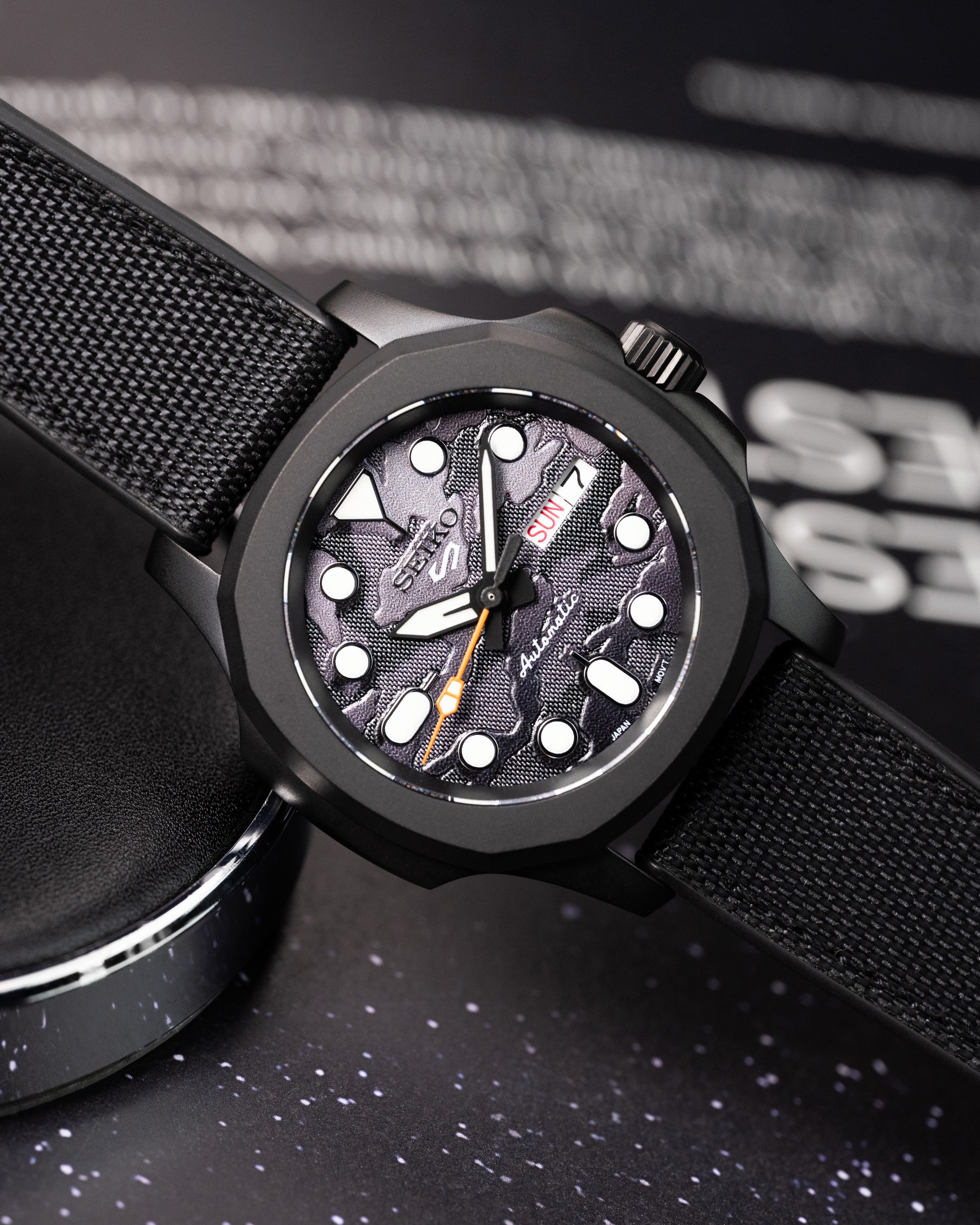 Custom Seiko Mod – With Blackout Nautilus Case Black Camo Textured Dial Orange Seconds Hand Orange S Crown Black Canvas Strap
