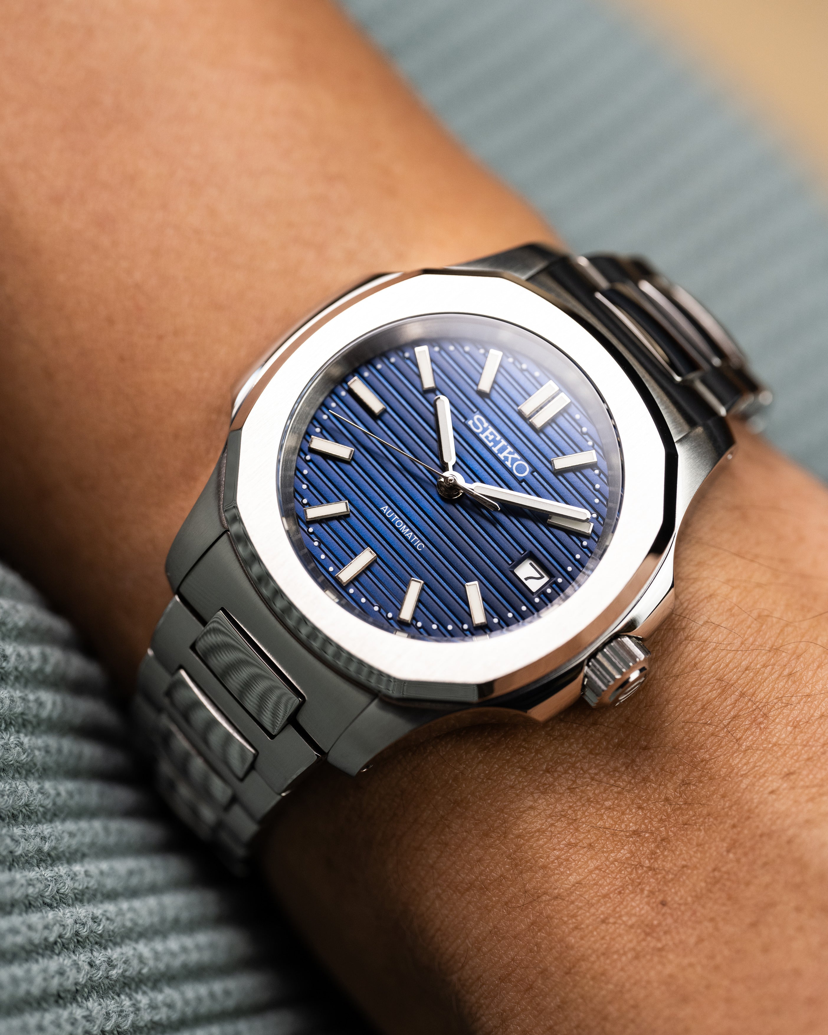 Custom Seiko Mod – With Nautilus Stainless Steel Case And Bracelet Textured Blue Dial Automatic Movement Date Display Worn On Hand2
