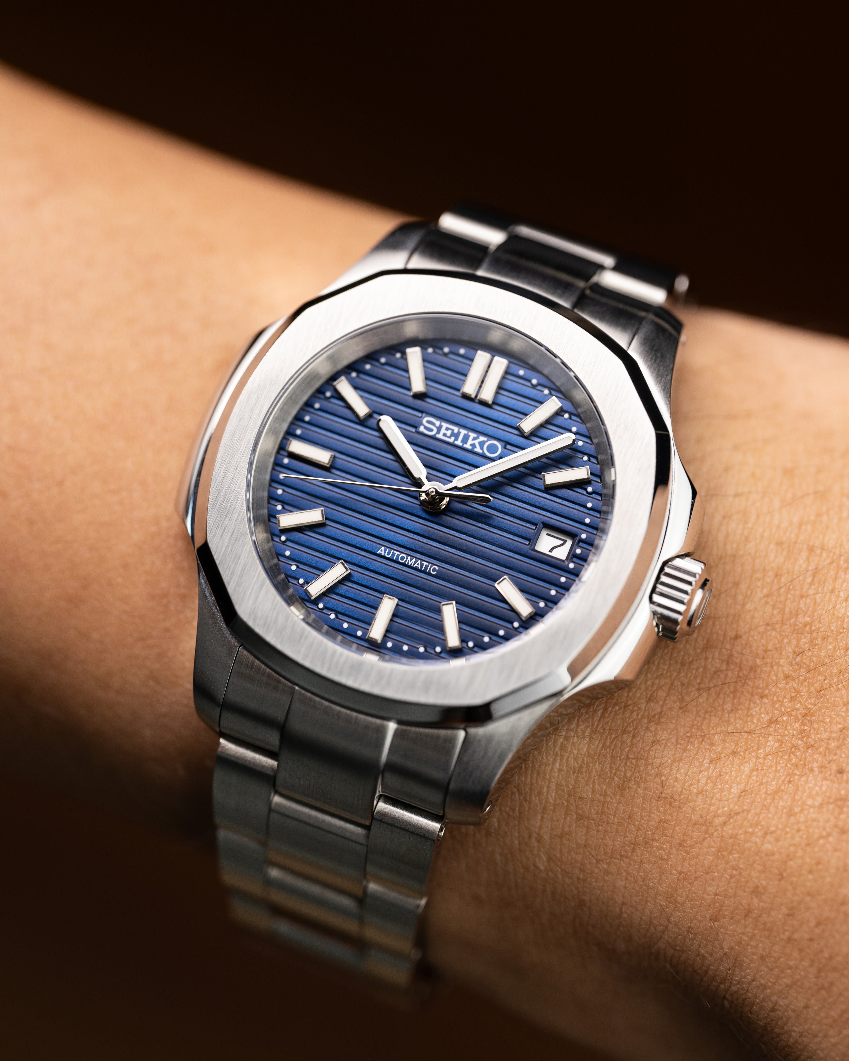 Custom Seiko Mod – With Nautilus Stainless Steel Case And Bracelet Textured Blue Dial Automatic Movement Date Display Worn On Hand3