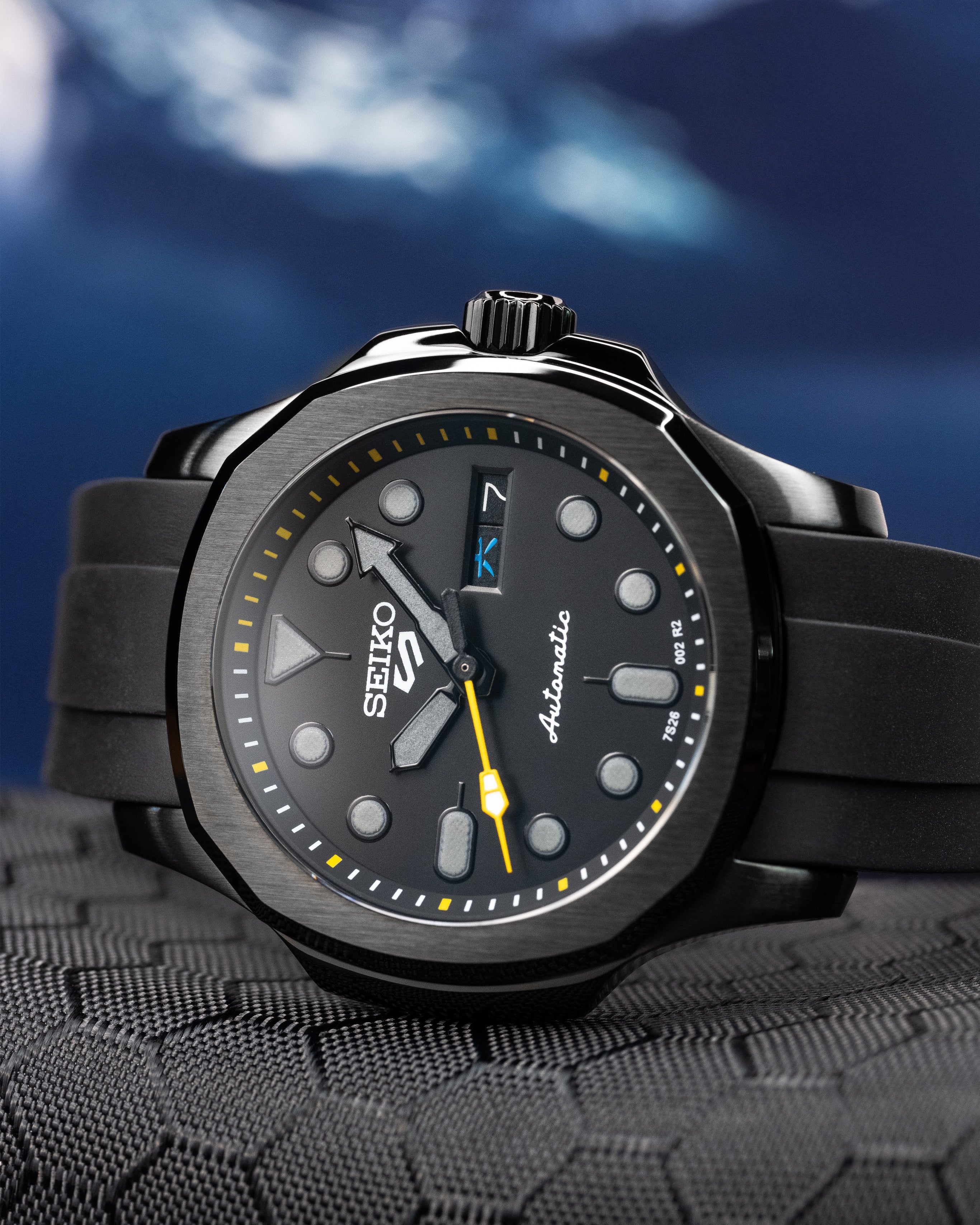 Custom Stealth Seiko 5 Mod – With Polished Black Nautilus Case Grey Indices Yellow Minute Track Yellow Second Hand And Black Rubber Strap