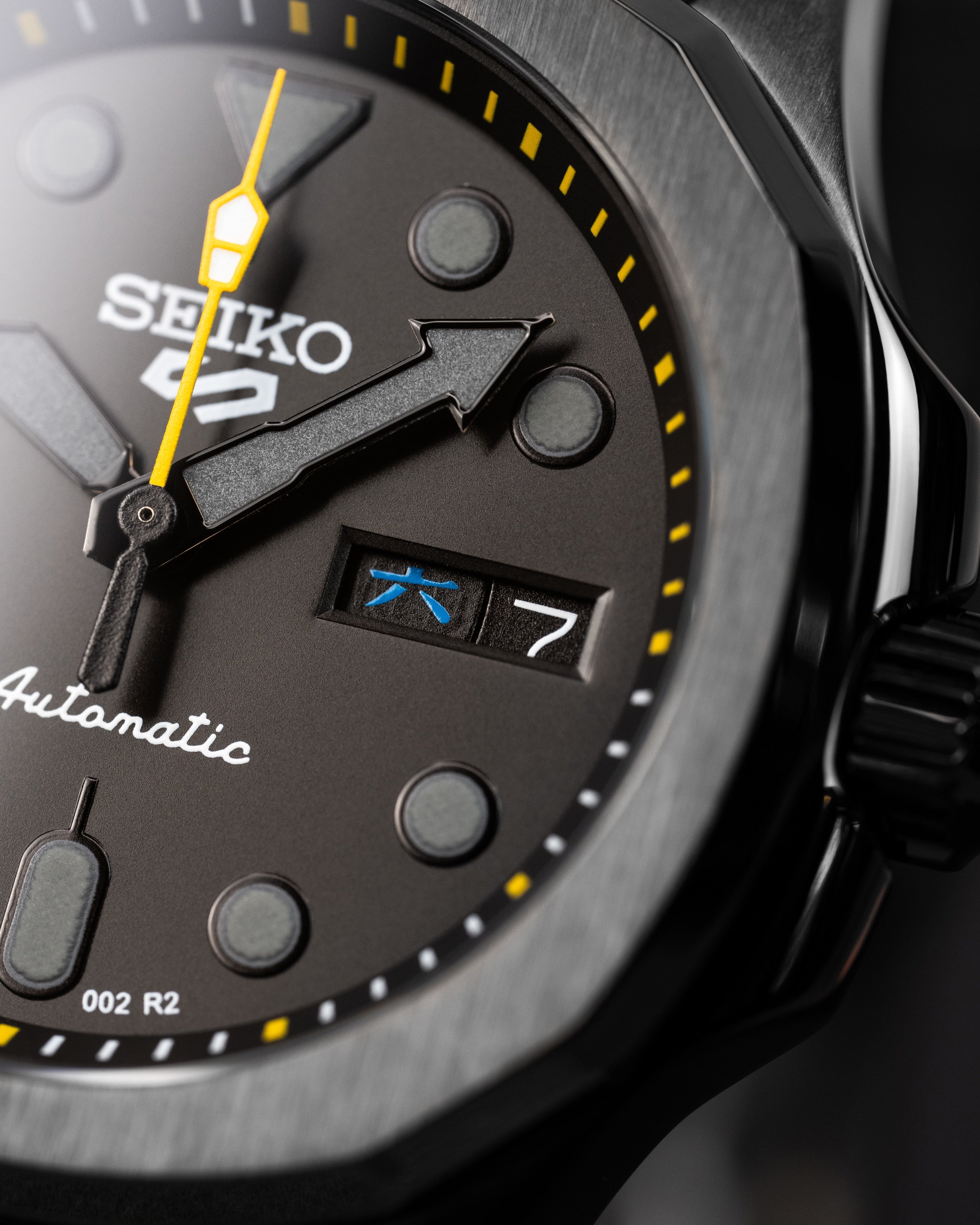 Custom Stealth Seiko 5 Mod – With Polished Black Nautilus Case Grey Indices Yellow Minute Track Yellow Second Hand And Black Rubber Strap