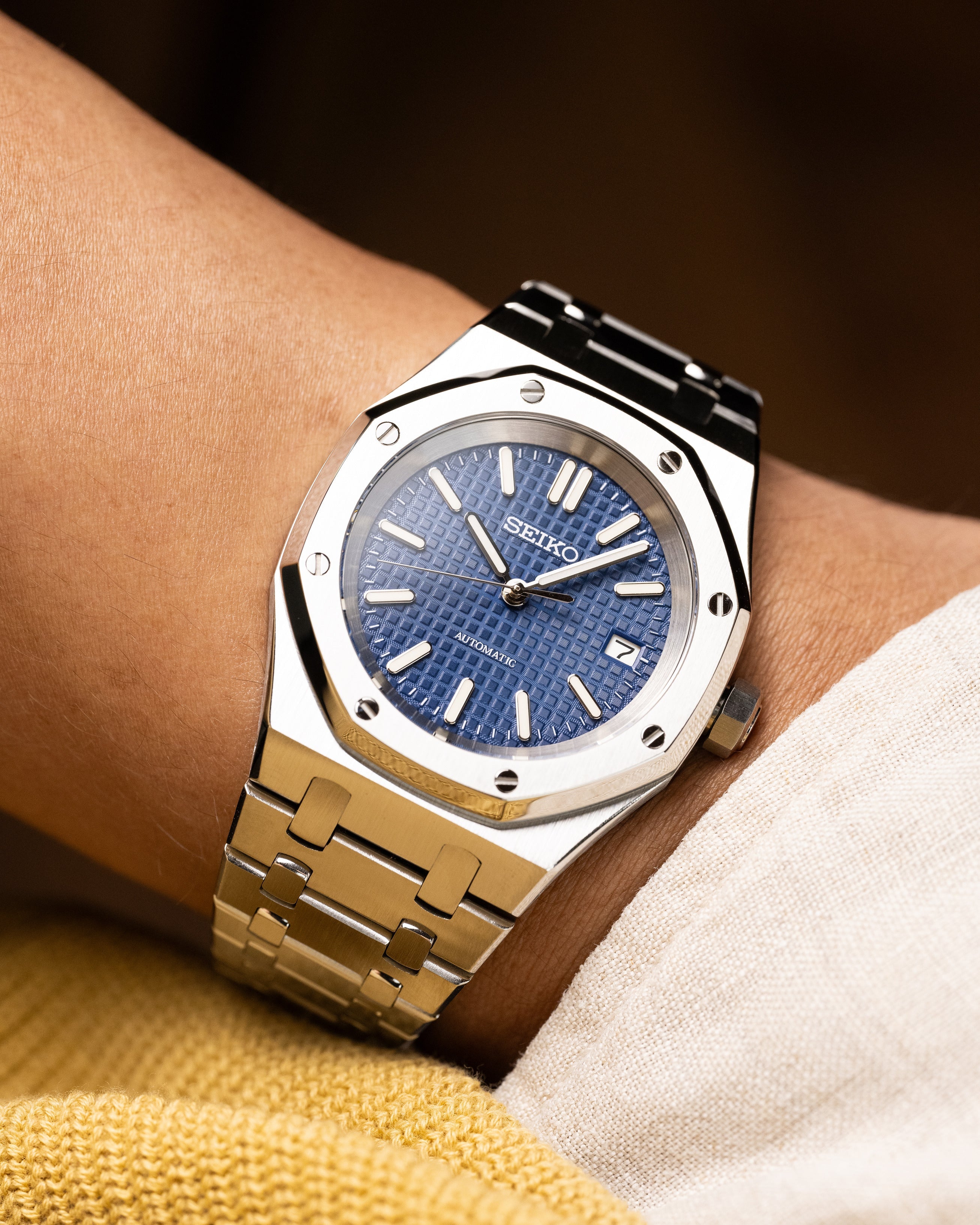 Custom Seiko Mod – Royal Oak Ap Homage With Brushed Stainless Steel Integrated Bracelet Blue Waffle-Textured Tapisserie Dial And Octagonal Bezel Wearing On Hand4